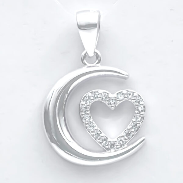 Dije luna y corazón